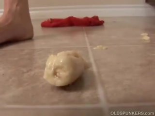 Perfected redhead plays with food