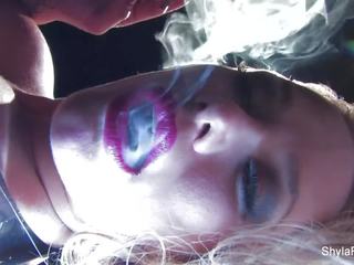 Busty blonde Shyla's smoking smashing tease