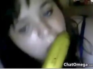 Apkūnu kamera jaunas ponia su a bananas